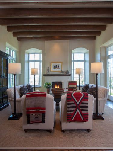 Native American blankets can add color and pattern to a neutral room, and make it seem relaxed. Love Pendleton Blanket Living Room, Native American Rugs Living Room, Modern New Mexico Interior Design, Pendelton Living Room, Southwest Modern Living Room, Native American Living Room, Native Blankets, Santa Fe Interior Design, Modern Southwest Style