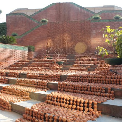 This contemporary ceramic art installation uses tiny clay lamps meant for spiritual practices to make a plea on behalf of the Earth. Clay Installation Art, Clay Architecture, Clay Lamps, Ceramic Installation, Straw Art, Exhibition Ideas, Environmental Consciousness, Ancient Buildings, Earth Art