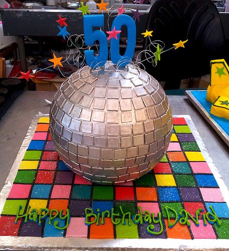 3D Disco ball shaped Wicked Chocolate cake, decorated with… | Flickr Disco Ball Theme Cake, Disco Ball Bday Cake, Cakes With Disco Balls, Purple Disco Birthday Cake, Disco 50th Birthday Cake, Disco Ball Cake, Disco Theme Party, Disco Cake, 70s Party Theme