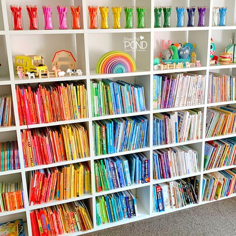 Rainbow Homeschool Room, Rainbow Craft Room, Rainbow Shelf Decor, Kids Home Library, Reader Aesthetic Girl, Rainbow Book Shelf, Girl In Library, Rainbow Bookcase, Rainbow Bookshelf Aesthetic