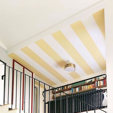 Clever on Instagram: "Striped ceilings forever!! This one by @driesotten is the perfect reason to look up 💫 #regram @driesotten" Coloured Ceilings, Stripe Wall Paint Ideas, Stripes Wall Paint, Gold Striped Walls, Striped Walls Vertical, Striped Ceiling, Striped Nursery, Hallway Ceiling, Yellow Ceiling