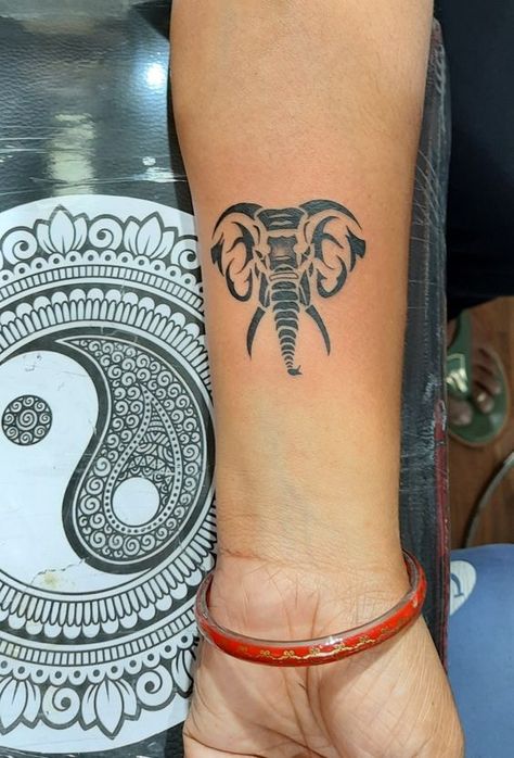 18 Elephant Tattoos: Simple Ideas that Make a Big Impact Big Elephant Tattoo, Indian Elephant Tattoo, Elephant Head Tattoo, Geometric Elephant Tattoo, Elephant Tattoo Ideas, Mandala Elephant Tattoo, Maching Tattoos, Tattoo 2024, Tier Tattoo