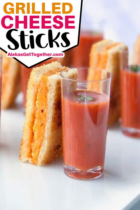 These Mini Grilled Cheese Sticks are the perfect fancy appetizer to serve at any party. They're made in the oven so you can prep large batches ahead of time that will serve a crowd! Pair your sticks with ready-made tomato soup and pour it into a cute plastic shooter for easy dipping! Grilled Cheese Tomato Soup Appetizer, Grilled Cheese Hors D’oeuvres, Mini Grilled Cheese And Tomato Soup, Tomato Soup And Grilled Cheese Appetizer, Grilled Cheese And Tomato Soup Shooters, Tomato Soup Shooters, Grilled Cheese Sticks, Mini Grilled Cheese, Baked Grilled Cheese