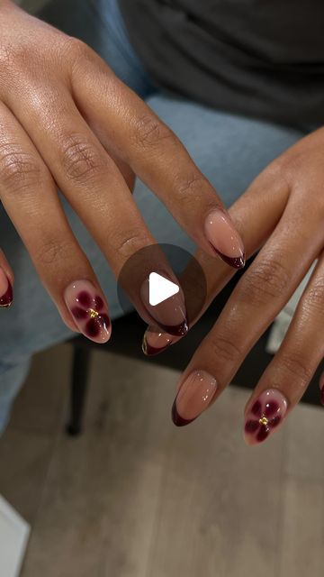 IT’S A LIFESTYLE NAILS | SAN JOSE on Instagram: "These blooming gel flowers are my new obsession🌺
The original Inspo was all French but we added some chrome gold details and another flower on the thumbs✨
Using @daily_charme gold chrome as always code: Elena10
@kokoistusa honey tea base 
@vbeautypure 003 burgundy gel 
.
.
.
.
.
.
#sanjosenails #bayareanails #almondnails #natutalnails 
#chromenails #nailinapo #fallnails" French Blooming Gel, Burgundy Blooming Gel Nails, Blooming Gel Nails Fall, French Flowers Nails, Burgundy Flower Nails, Brown Blooming Gel Nails, Blooming Gel Flower Nails, Blooming Gel French Tip, Blooming Flower Nails