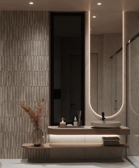 Discover a beautiful bathroom with stylish LED lighting, rounded shapes, textured walls, and chic black accents on beige interiors. Every detail radiates pure luxury 👌🏼 Follow @lyxvillan for more inspiration Credit: @tawazon_architects #luxuryliving #luxurybathroom #luxurybathrooms #modernbathroom #lightingdesign #lightingideas #lightinginspiration #bathroomlighting Luxurious bathroom, LED lighting, rounded shapes, textured walls, black accents, beige interiors, stylish design, elegant b... Bathroom Modern Lighting, Contemporary Washroom Design, Door Design Interior Unique, Wc Modern Design, Tawazon Architects, Luxury Bathroom Black, Dark Moody Bathroom Ideas, Beautiful Bathrooms Luxury, Beige Tiles Bathroom