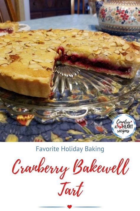 This Cranberry Bakewell Tart is my attempt at a traditional British tea pastry. Lined with a buttery shortbread crust, and filled with almond cream (frangipane) and a touch of brandy, plus a thick delicious cranberry sauce, it received a thumbs up from our daughters. #cranberrybakewelltart #britishtart #frangipane #almondfilling #desserts #holidaybaking #asbachuraltbrandy #cranberries #teaparty #countryatheartrecipes https://countryatheartrecipes.com/2020/12/cranberry-bakewell-tart/ Cranberry Pound Cake Recipe, Holiday Tea Party, British Baking Show Recipes, Frangipane Tart, Heart Recipes, Bakewell Tart, Buttery Shortbread, British Tea, Frozen Cranberries