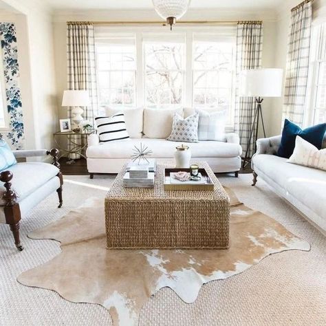 A rug above the rest where a layered cowhide takes center stage, adding depth and dimension to the living room's rustic-chic vibe, and tying together the entire space with its earthy tones and organic texture Explore variety of natural cowhides at our store🛍 Ebay: www.ebay.com/str/storeera 🛒 Etsy: www.etsy.com/shop/storeera 🛒 🔗Link in bio #cowhiderug #cowprint #arearug #interiordesign #diyrug #cowhide #cow #braziliancowhide #genuinerug #interiordesign #interiordesignideas #floorrug #inter... Hide Rug Living Room, Layered Cowhide Rug, Cowhide Rug Living Room, Interior Simple, Coastal Living Rooms, Cowhide Rug, Décor Diy, Cow Hide, Cocktail Table