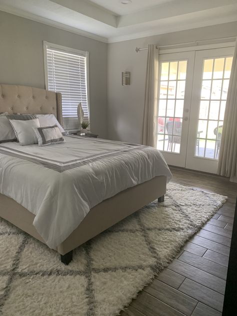 Master bedroom with gray tones Grey Wooden Flooring Bedroom, Brown Wooden Floor Bedroom, Gray Wood Floors Bedroom, Bedroom Wood Floor, Grey Hardwood Floors, Brown Furniture Bedroom, Grey Hardwood, Brown Floors, Grey Bedroom