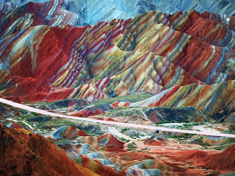 Are you ready for your daily dose of wanderlust (and then some)? These wonders around the world—from Seussian flower fields to seas that shine like stars—simply must been seen to be believed. Rainbow Mountains China, Zhangye Danxia Landform, Danxia Landform, Zhangye Danxia, Rainbow Mountains, Dark Hedges, Landform, Colorful Mountains, Rainbow Mountain