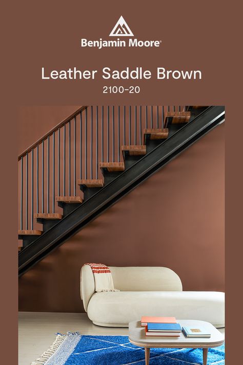 Get to Know Leather Saddle Brown 2100-20 from the Benjamin Moore Color Trends 2025 palette. An enveloping hue, inspired by the depth and character of well-worn leather. Leather Saddle Brown Benjamin Moore, Brown Paint Colors, Exterior Wood Stain, Trends 2025, Exterior Stain, House Color Palettes, Wood Stain Colors, Benjamin Moore Colors, House Color Schemes