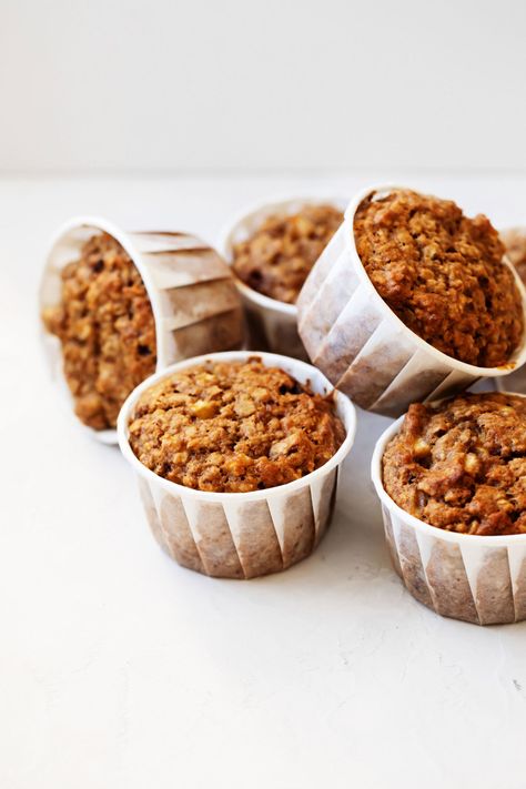 These vegan apple bran muffins are the perfect, wholesome muffin for fall. Made with bran, whole grain flour, and chopped fresh apple pieces, they're packed with fiber and good nutrition. #vegan #plantbased Vegan Bran Muffins, Vegan Banana Chocolate Chip Muffins, Apple Bran Muffins, Carrot Cakes, Vegan Carrot Cakes, Vegan Apple, Bran Muffins, Banana Chocolate Chip Muffins, Vegan Parmesan