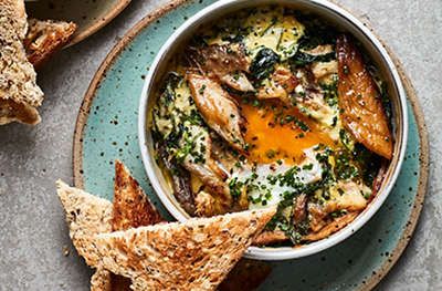 Smoked Mackerel & Spinach Baked Eggs Recipe | Waitrose & Partners Mackerel Fish Recipes, Pastry Case, Delicious Quiche, Spinach Bake, Baked Eggs Recipe, Mackerel Recipes, Smoked Mackerel, Mackerel Fish, Egg Recipe