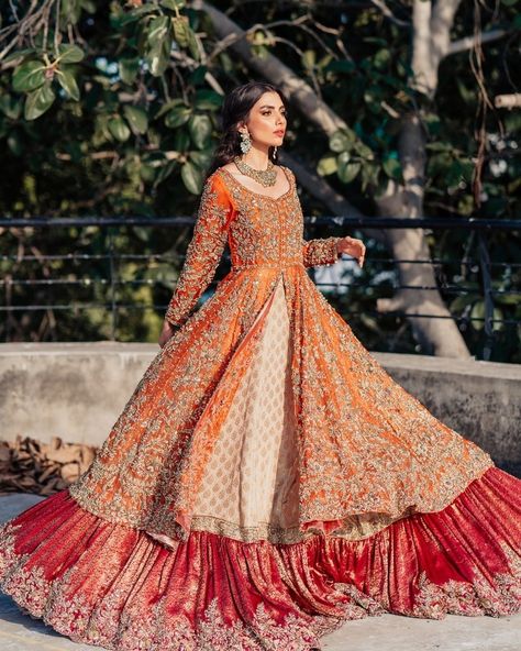 Amid rich rust tones and deep red threads, intricate hand-embroidery captures the soul of Pakistani couture, transforming every bride's dream into a timeless reality #IlsabySamsara #MadeWithLove #IlsaBride To book your consultations please WhatsApp +92 309 9095555 / +1 647 241 5675 / +447973448686 #bcwpakistan #humbridalcoutureweek #PakistaniWedding #PakistaniBride #PakistaniBridal #Valima #Walima #WalimaBride #ValimaBride #Barat #BaratBride www.samsara-world.com✨ Orange Bridal Dress, Nameera By Farooq, Bridal Anarkali, Mehndi Outfit, Bridal Mehndi Dresses, Pakistani Bridal Dress, Eid Dress, Anarkali Lehenga, Desi Wedding Dresses