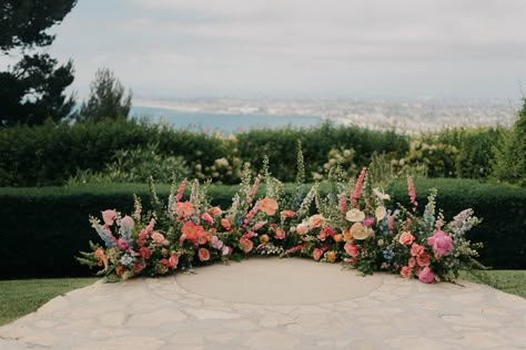 May Wedding Arch, Florals On Ground Wedding, Altar Ground Flowers, Flower Meadow Wedding Ceremony, Elopement Ceremony Flowers, Grounded Floral Arches Beach, Ground Floral Arch Ceremony, Ground Flowers Ceremony, Wildflower Alter Arrangements