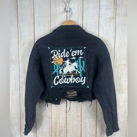 “Ride ‘Em Cowboy” Custom Reworked Denim Jacket. Elevate Your Style With The “Ride ’Em Cowboy” Custom Western-Themed Denim Jacket, A One-Of-A-Kind Piece Designed To Make A Statement. Each Jacket Is Carefully Handpicked And Reworked, Blending Rugged Charm With A Unique Twist For A Bold, Standout Look. Featuring A Cropped, Distressed Design, This Versatile Jacket Is Perfect For Creating A Fun, Effortless Vibe. Though Labeled As A Women’s Large, Its Relaxed Fit Comfortably Flatters Sizes Small To La Reworked Denim Jacket, Buckle Jackets, Cool Silhouettes, Reworked Denim, Versatile Jacket, Western Jacket, Custom Jacket, Jean Jacket, Halloween Shopping