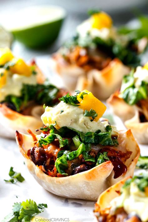 Salsa Verde Honey Lime Chicken Taco Cups - the cheesy sweet heat packed into these crispy, taco cups is so addicting and the mango guacamole is the perfect finishing touch! Whenever I serve these for an appetizer they get gobbled right up! Chicken Taco Cups, Mango Guacamole, Wonton Wrapper Recipes, Lime Chicken Tacos, Taco Cups, Honey Lime Chicken, Wonton Cups, Salsa Verde Chicken, Chicken Taco