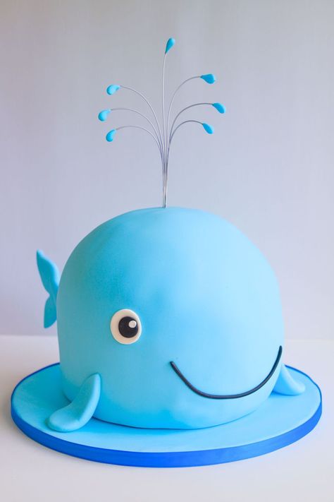 Whale-themed 1-tier baby shower cake for boys in bright blue with a smiling whale design. This adorable cake design adds a playful element to a baby boy’s shower. Cake Designs Baby Boy, Cake Designs Blue, Baby Shower Cake For Boy, Boy Baby Shower Cakes, Blue Baby Shower Cake, Whale Cakes, One Tier Cake, Boy Cakes, Boys Cake