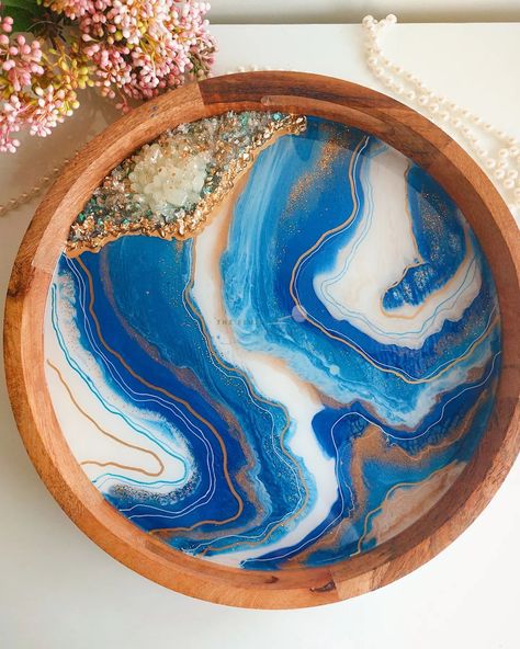 This Mother's Day, celebrate the amazing woman who lights up your life! ✨✨ This STUNNING CUSTOM WOODEN TRAY, handcrafted with Resin on a mango wood base and featuring a mesmerizing blue and white geode with crystals, is a one-of-a-kind treasure.💫💫 Imagine Mom using this beauty to serve tea and cookies, or displaying it as a conversation starter in her home. It's a reminder of your love and appreciation, with a touch of global elegance. 📝DM us to see our full collection of custom trays and ... Treasure Imagine, Tea And Cookies, Amazing Woman, Wooden Tray, Mango Wood, Amazing Women, The Amazing, Light Up, Mother's Day