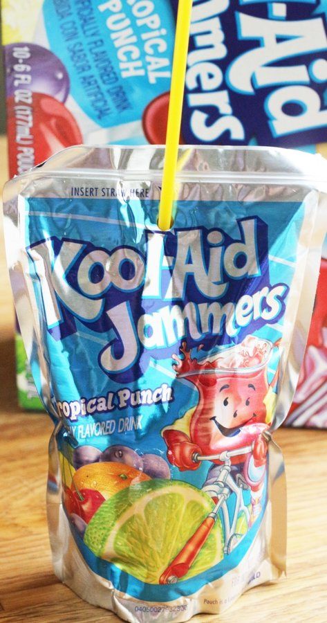 What is in Kool-Aid Jammers? Ingredients and Review Kool Aid Aesthetic, Kool Aid Juice, Koolaid Jammers, Kool Aid Jammers, 2000s Food, Early 2000s Party, 90's Room, Lunch Kids, Mary Birthday