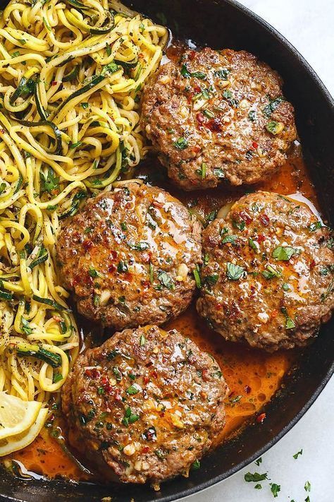 Cheesy Garlic Burgers with Lemon Butter Zucchini Noodles Garlic Burgers, Butter Zucchini, Burger Steak, Sliced Onion, Hamburger Patties, Lemon Butter, Zucchini Noodles, Idee Pasto Sano, Onion Soup