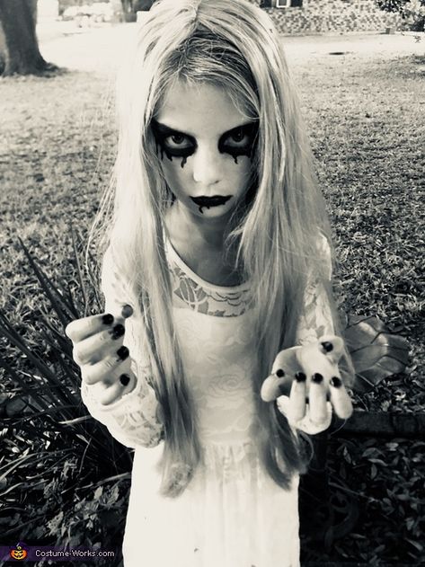 This is my daughter Mckenzie. She came up with idea of being a ghost. Her exact words “And not just a regular ole’ ghost with a sheet.” We purchased a lace dress, painted her face white with Halloween makeup, and I did her black eye... Photo 2 of 3. Ghoul Costume, Ghost Face Paint, Last Minute Costume Ideas, Costume Last Minute, Ghost Makeup, Last Minute Costume, Eye Photo, Costume Works, Amazing Halloween Makeup