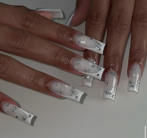 Trendy Nails Ideas White, Long White And Silver Nails, Long White French Tip Nails With Rhinestones, Hot Acrylic Nails, Silver White Acrylic Nails Prom, Nails With Piercing, White And Silver Long Acrylic Nails, Classy Birthday Nails, White Nails With Rime Stones