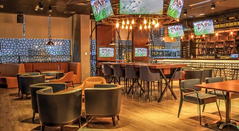 The 10 BEST Sports Bar Design Ideas: How To Design A Sports Bar (2024) Restaurant Lighting Design, Sport Bar Design, Bar Design Ideas, Sports Bars, Brunch Places, Casual Dining Restaurant, London Bars, Restaurant Lighting, Restaurant Concept