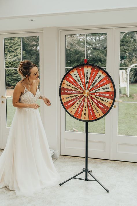 Wedding Game Ideas Spin The Wheel Rebecca Carpenter Photography #wedding #weddinggame Wedding Unusual Ideas, Wedding Games Ideas, Wedding Game Ideas, Bridal Chair, Quirky Wedding Ideas, Carpenter Photography, Hoop Decor, Casino Jackpot, Wedding Car Hire