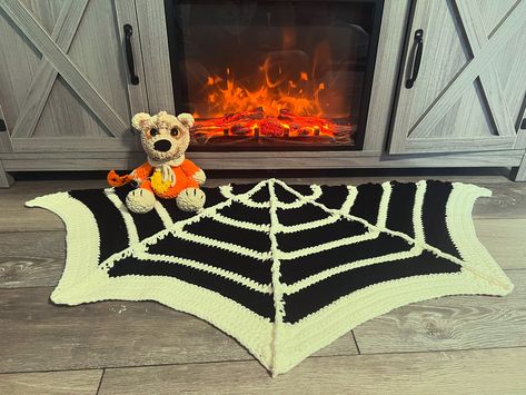 I had the privilege of testing this Awesome spiderweb rug pattern by @hollyborealisart love how it turned out! Go give her a follow and if you like spooky things get this pattern and go check out her other awesome patterns! It’s available in her Etsy shop! The adorable Sam bear was made by @hookedwithmajorlove 🧡🖤 #spiderweb #rug #spookyrug #halloween #halloweendecor #halloweenrug #crochet #patterntes Spiderweb Rug, Spooky Things, Rug Pattern, Spider Web, Halloween Decorations, Etsy Shop, Rug, Turn Ons, Halloween