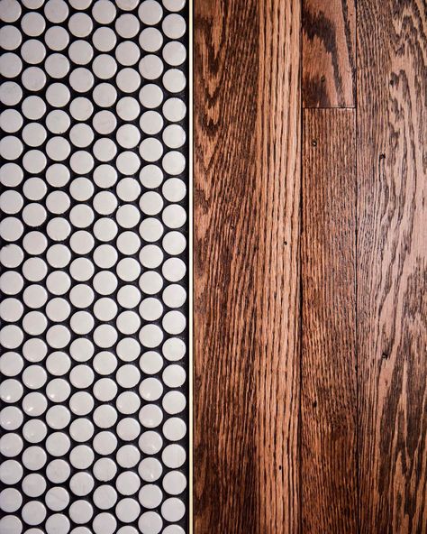 Floor transitions between tile and wood do not have to be your typical threshold. We used a brass shluter to tie the two materials together�… Floor Transitions, Tile Transition, Penny Round Tile, Bathroom Organizing, Bath Redo, Penny Round Tiles, Cle Tile, Penny Tile, Penny Round