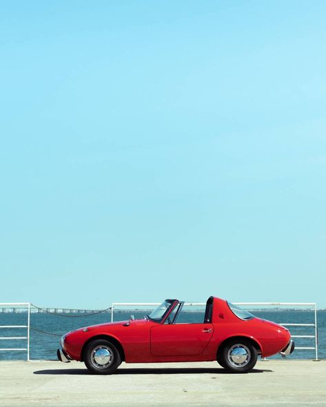 The Toyota Sports 800 was Toyota's first production sports car and went into production in 1965. Toyota Sports Car, Toyota Vintage Cars, Toyota 80 Series, Toyota Sports 800, Toyota 70 Series, Toyota 2000gt, First Cars, Car Find, Red Interiors