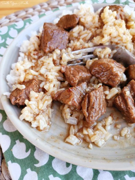 Stewed Beef (Beef Tips) with Gravy! A tried-and-true family recipe for stew beef or beef tips slow-cooked until tender with a rich gravy served over rice, mashed potatoes or noodles. Stew Meat With Cream Of Mushroom Soup, Beef Stew And Rice Recipes, Beef Tips With Rice, Easy Stew Meat Recipes Stove Top, Beef Tips And Gravy Stove Top Quick, Beef Stew Over Rice, Stew Meat And Gravy, Beef Stew Meat Recipes Stovetop Quick, Beef Tips And Gravy Stove Top