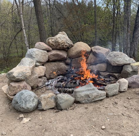 Stacked rock fire pit Rock Fire Pit Ideas, Natural Rock Fire Pit, Fire Pit Natural Stone, Rock Fire Pit, Natural Fire Pit, Make A Fire Pit, Fire Pit With Rocks, Outdoor Fire Pit Area, Fall Deck