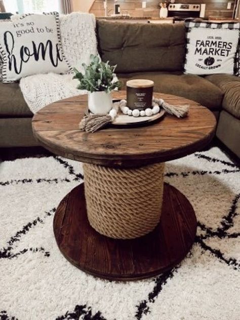 "Smoothly finished re-claimed wire spool tables wrapped with 1\" manila jute rope. The tables comes stained to the color of your choice and finished with an outdoor sealant. The table has 1.5\" legs on the bottom to raise off the ground. Table shown dimensions are 27\" wide x 22.5\" tall Other spool dimensions are available. Burnt finish is available. Also available without the rope Each spool has different wear and tear so every table is unique. Quick Local delivery within 50 miles of Atlanta Wire Spool Tables, Wire Spools, Spool Tables, Wire Spool, Wood Spool, Casa Country, Wooden Spools, Western Homes, Western Home Decor