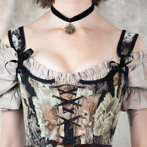 French Meadows Corsets on Instagram: "The purrfect Renaissance kitty 🐱 I just love the way the colors of this Cat Tapestry Corset blend so well with my earth tone wardrobe! Call me a cat lady, but I'd never pass up an opportunity to wear clothing with cats on it. #renaissancefestival #corsettop #catlover #cats cat corset top, tapestry bodice, tapestry corset, renaissance faire costume, cat costume" Earth Tone Wardrobe, Cat Corset, French Meadows, Tapestry Corset, Cat Tapestry, Cat Costume, Cat Costumes, Goth Outfits, Vintage Cat