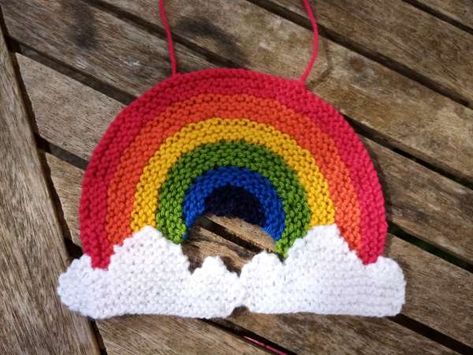 This Rainbow Knitting pattern is available for free via Deramores, all you have to do is select the “Digital Pattern” option in the drop-down menu to grab the pattern for free. Rainbows have become a symbol of hope during isolation …#rainbow #knitting #knittingpatterns #freeknittingpatterns Diy Christmas Hanging Decorations, Easter Knits, Knitted Rainbow, Aran Knitting, Rainbow Window, Pattern Rainbow, Knitting Kit, Dishcloth Pattern, Christmas Hanging Decorations