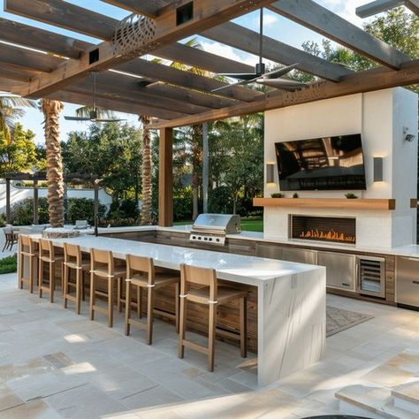 Click for details! What if you could cook your best recipes and entertain your guest in the comfort of your backyard? Follow us for more furniture and design inspiration! #myfaceoutdoordesign #outdoordesign #kitchendesign #outdoorkitchen #outdoorkitchenideas #outdoorkitchendecor #furnituredesign #designinspiration #summerkitchen #summerkitchen Outdoor Pool Kitchen Ideas, Outdoor Kitchen Next To Pool, Pergola With Outdoor Kitchen, Stucco Backyard, Florida Outdoor Kitchen, Outdoor Kitchen Pergola, Outdoor Kitchen And Dining, Outdoor Kitchen Bar, Pool Kitchen