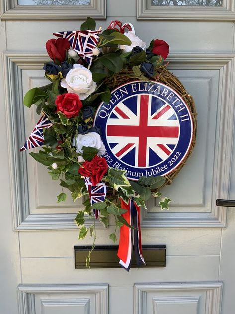 A lovely piece of decor for your house or garden this Jubilee.  I also have available matching bunting.  Mini Union Jack flags are inserted to left of wreath to give it one amazing look! Handmade Flags, Church Flowers, Flower Arrangements Diy, Christmas Swags, Flower Display, Handmade Wreaths, Beautiful Wreath, Wreath Decor, Door Wreath