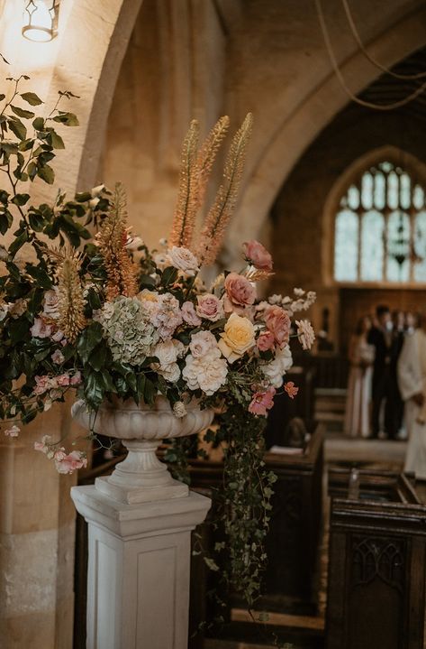 Late summer wedding in the Cotswolds with bride in Suzanne Neville dress and flowers in elegant neutrals of soft champagne, blush and ivory. Bouquets, church flowers, marquee pole installations and table flowers by Cotswolds florists Corky and Prince. Ethereal Wedding Flowers, Home Reception, Cotswold Wedding, Floral Sculpture, Marquee Tent, Summer Wedding Flowers, Church Door, Late Summer Wedding, Church Wedding Flowers