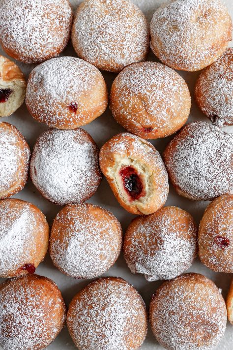 These Chanukah jelly donuts, often called sufganiyot, are deliciously puffy and super easy to make! #chanukah #jellydonut #sufganiyot #easydonuts #frostingandfettuccine Donut Recipe Easy, Hanukkah Desserts, Jelly Donuts, Donut Ideas, Jelly Doughnuts, Jewish Cuisine, Easy Donuts, Hanukkah Food, Donut Recipe