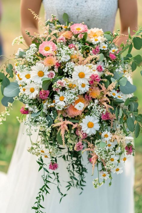 These 30 whimsical meadow wedding bouquets are unforgettable! Filled with wildflowers, soft tones, and greenery, they’re ideal for boho or rustic themes. Browse them all! #whimsicalstyle #meadowvibes #wildflowerinspo Wild Flower Bouquet Wedding Wildflowers Wildflower Centerpieces, Earth Wedding Colors, Summer Wedding Colors Wildflowers, Wedding Daisy Bouquets, Wedding Decor Wildflowers, May Flowers In Season, Wild Flower Wedding Flowers, Wedding Bouquets With Daisies, Wildflower Country Wedding