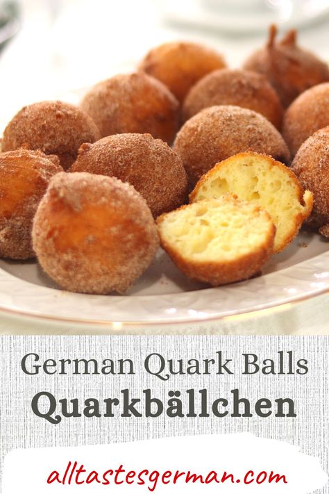 German style donut holes. Quark balls aka Quarkbällchen on a white plate.