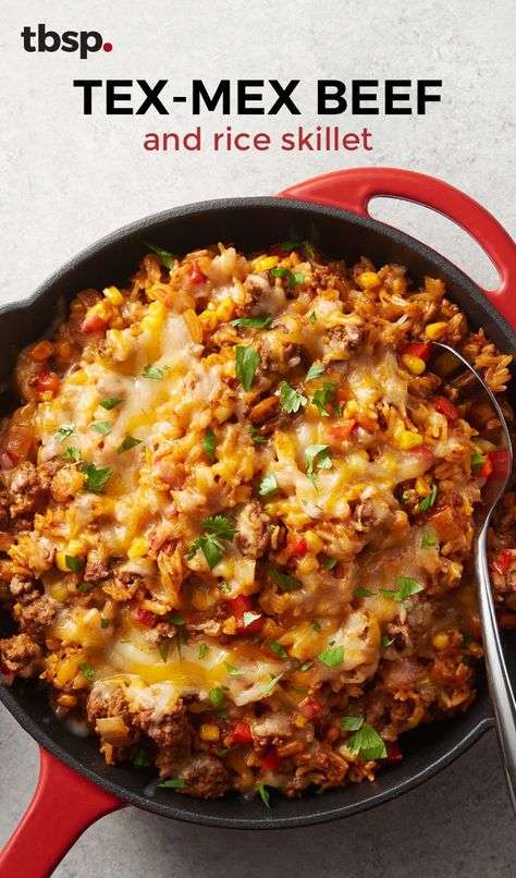 Say goodbye to boring ground beef and cue this beef and rice skillet dinner that packs on the flavor. Diced yellow onion, red bell pepper, enchilada sauce, taco seasoning and rice get cooked in a skillet and topped with cheese for the easiest weeknight dinner ever. Beef And Rice Skillet, Rice Skillet, Skillet Dinners, Beef And Rice, Ground Beef Recipes For Dinner, Beef Casserole, Beef Recipes For Dinner, Beef Dinner, Enchilada Sauce