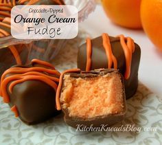 Oh.  My.  Goodness.  Do you want your taste buds to sing this holiday season?  Make.  This.  Fudge.  It’s so easy to make.  Go ahead.  Make some now.  Here’s the recipe: Chocolate Dipped Orange Cream Fudge 6042462  Ingredients 3 cups granulated sugar 3/4 cup butter 2/3 cup evaporated milk (not sweetened condensed milk) 12 oz. orange [...] Orange Cream Fudge, Holiday Fudge Recipes, Holiday Fudge, Cream Fudge, Christmas Fudge, Fudge Candy, Oh Fudge, Candy Truffles, Candy Recipes Homemade