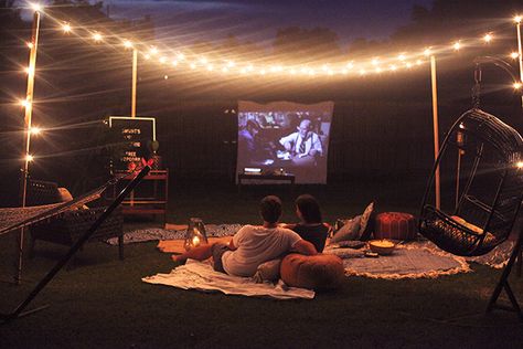 Backyard Movie Night | In Honor Of Design Backyard Lighting Diy, Backyard Movie Theaters, Long John Silver, Dream Dates, Diy Clothes Rack, Backyard Movie Nights, Outdoor Cinema, Backyard Movie, Cute Date Ideas