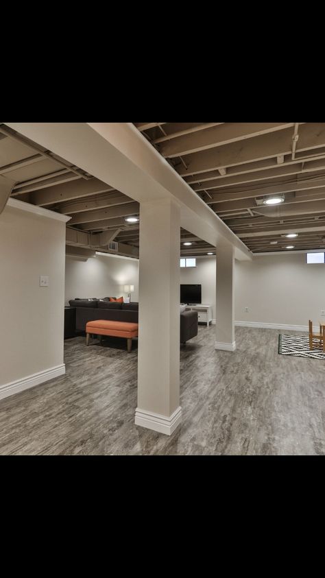 Wall color and floor Framing Basement Walls, Finishing Basement Walls, Basement Remodeling Diy, Low Ceiling Basement, Basement Organization, Basement Remodel Diy, Basement Finishing, Basement Inspiration, Basement Living Rooms