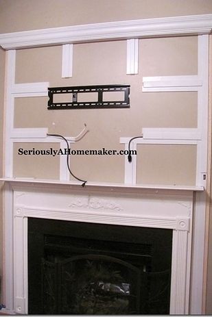 Hide your cords in trim work. | 36 Genius Ways To Hide The Eyesores In Your Home Hutchinson House, Hide Tv Cords, Tv Cords, Tv Mounted, House Upgrades, Fireplace Mantles, Hidden Tv, Rooms Design, Shelving Design