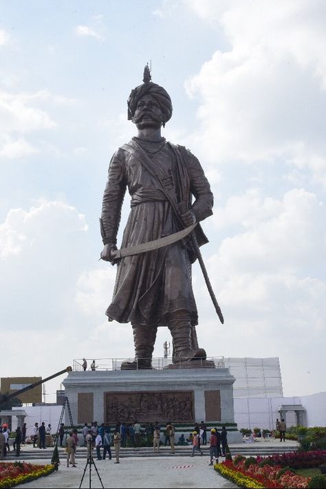 Prime Minister Narendra Modi will unveil the 108 feet bronze statue of Nadaprabhu Kempegowda on Friday.The bronze statue, the "Statue of Prosperity", was built to commemorate the contribution of Nadaprabhu Kempegowda, the founder of the city, towards the growth of Bengaluru.BCCL"Conceptualized and sculpted by Ram V Sutar of Statue of Unity fame, 98 tonnes of bronze and 120 tonnes of steel have gone into making this statue," PMO said.Who is Nadaprabhu Kempegowda?Nadaprabhu Hiriya Kempe Gowda, als Kempegowda Photos, Indian Flower Names, Kempegowda Statue, Famous Indian Actors, Kempegowda International Airport, Perfect Red Lips, Indian Flowers, Lord Shiva Hd Wallpaper, Guinness Book