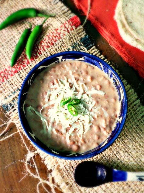 Comfort Food Classics: Refried Pinto Beans Mexican Refried Beans, Bean And Cheese Enchiladas, Roasted Tomatillo, Mexican Crema, Oaxaca Cheese, Frijoles Refritos, Homemade Mexican, Cheese Enchiladas, Latin Food