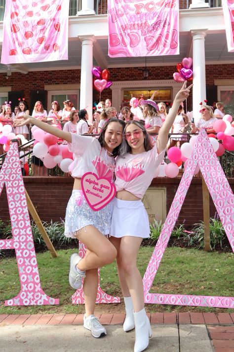 Alpha Gamma Delta, pink bid day, bid day 2022, sorority bid day, hearts bid day Valentines Day Bid Day Theme, Heart Sorority Theme, Bid Day Name Signs, Pink Bid Day, Bid Day Themes Sorority, Frat Party Aesthetic, Greek Letters Painted, Sorority Recruitment Tips, Rush 2013